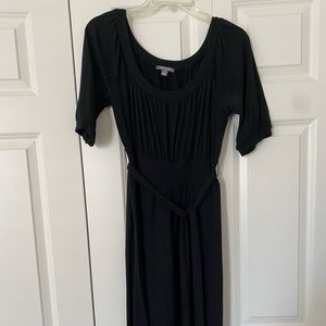 Black dress. Flowy sleeves.
